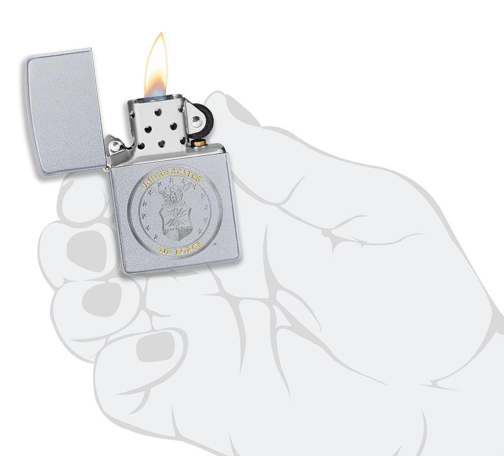 U.S. Air Force Satin Chrome windproof lighter in hand and lit